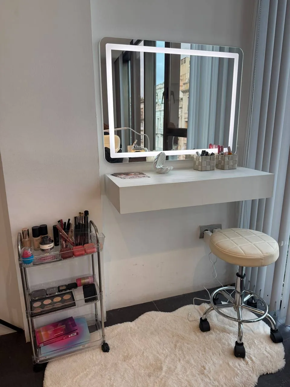 Make-up vanity with lit mirror at Nude Beauty Studio